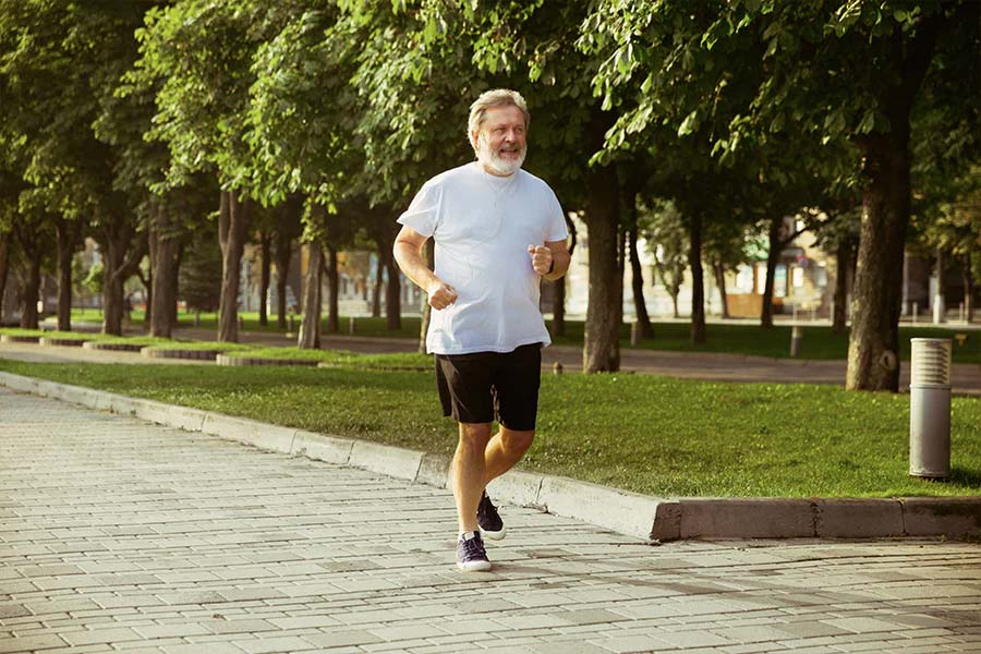 Walking 7,000 steps a day can reduce the risk of many diseases, say researchers