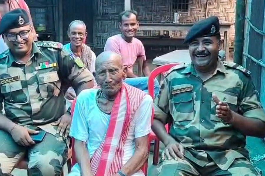A grand feast of food for the elderly in a village in Cooch Behar