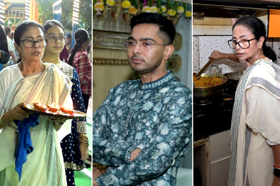 Mamata Banerjee and Abhishek Banerjee celebrating Kali Puja with family