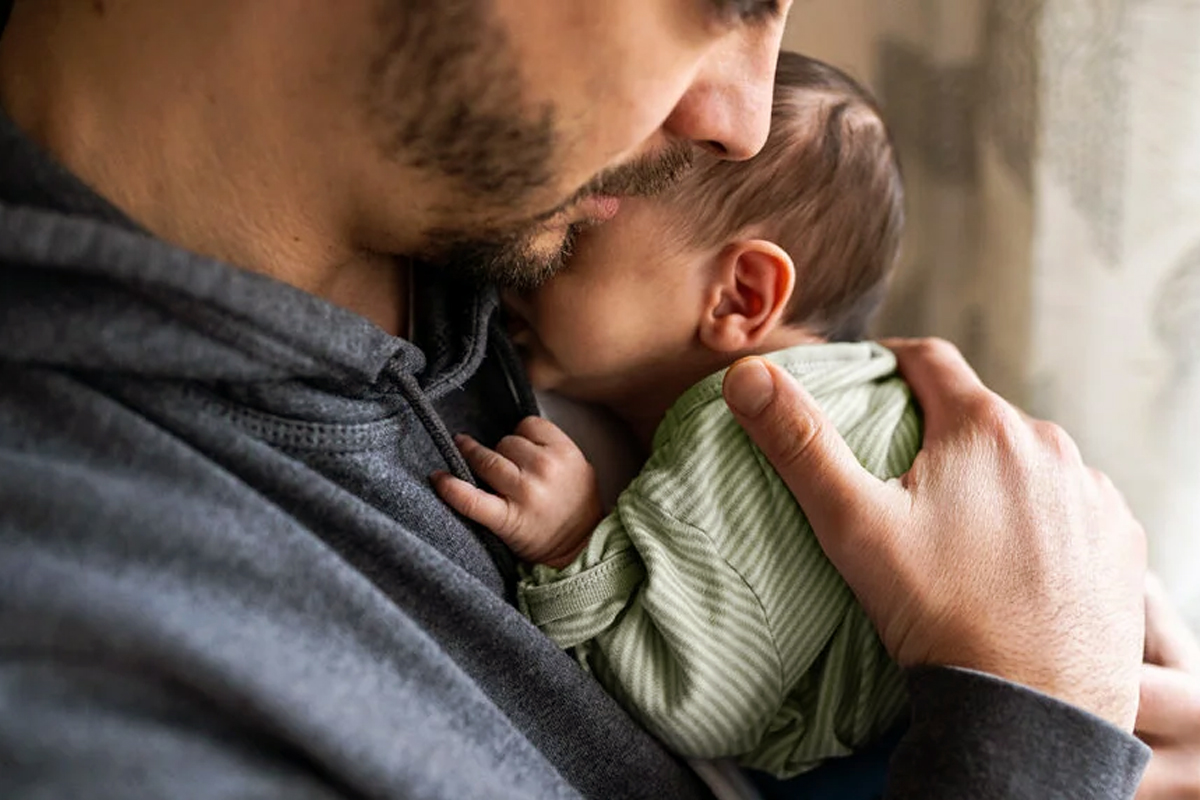 postpartum depression men fathers risk one year after baby