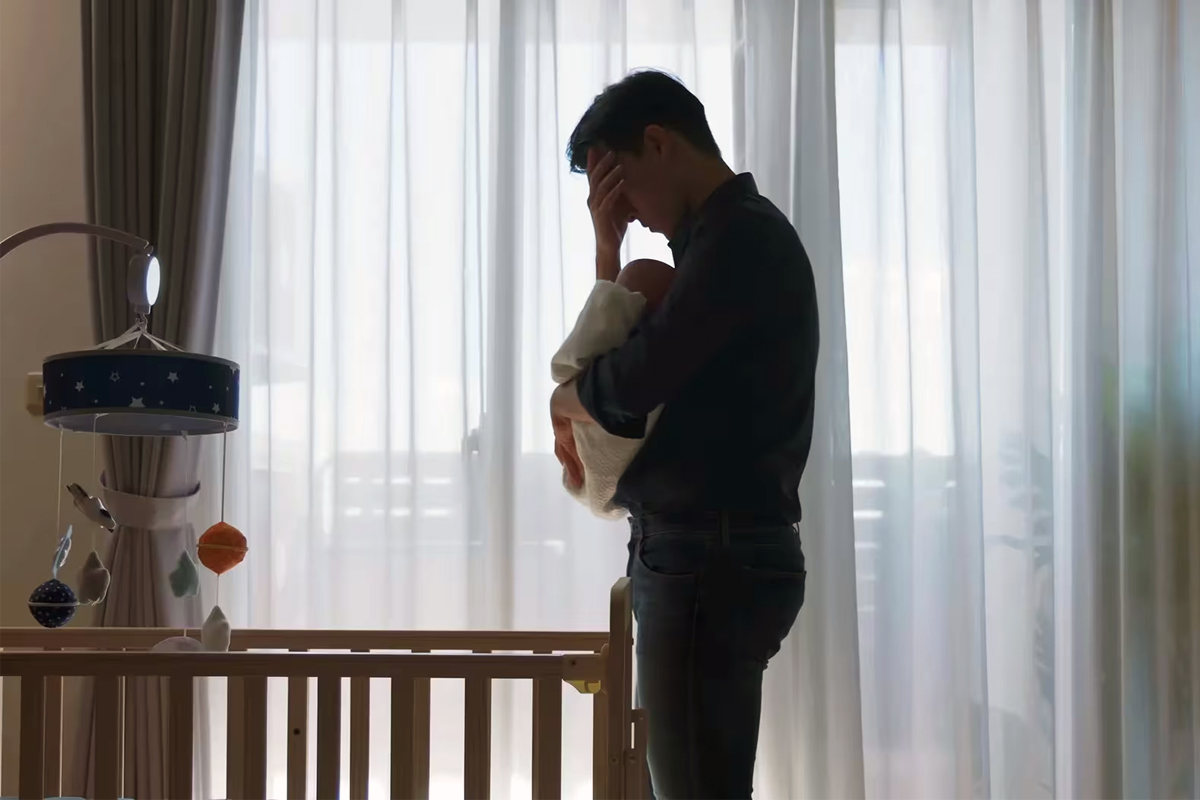 postpartum depression men fathers risk one year after baby