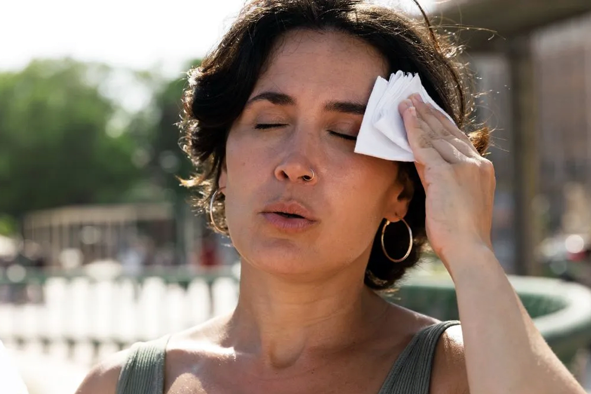 Health tips why hot flashes increase in women before summer