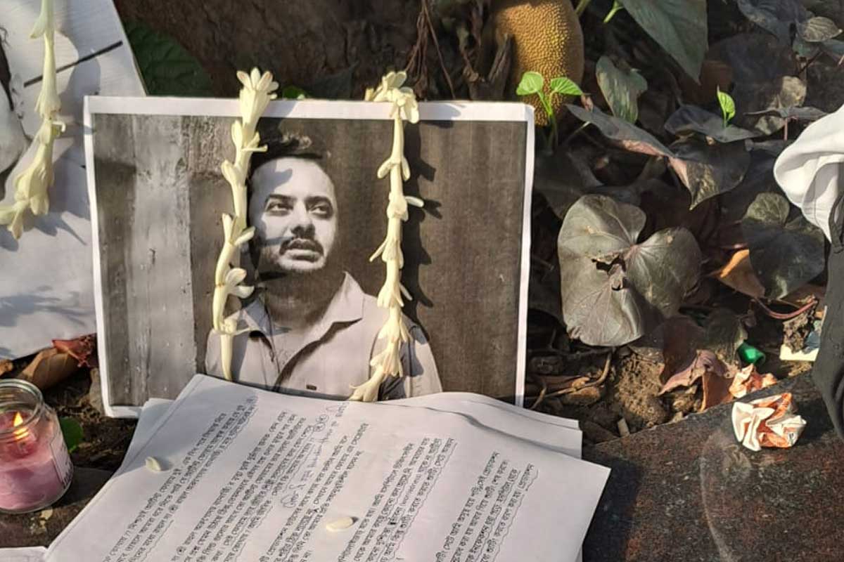 Garlanded portrait of Rahul Banerjee during tribute after his death
