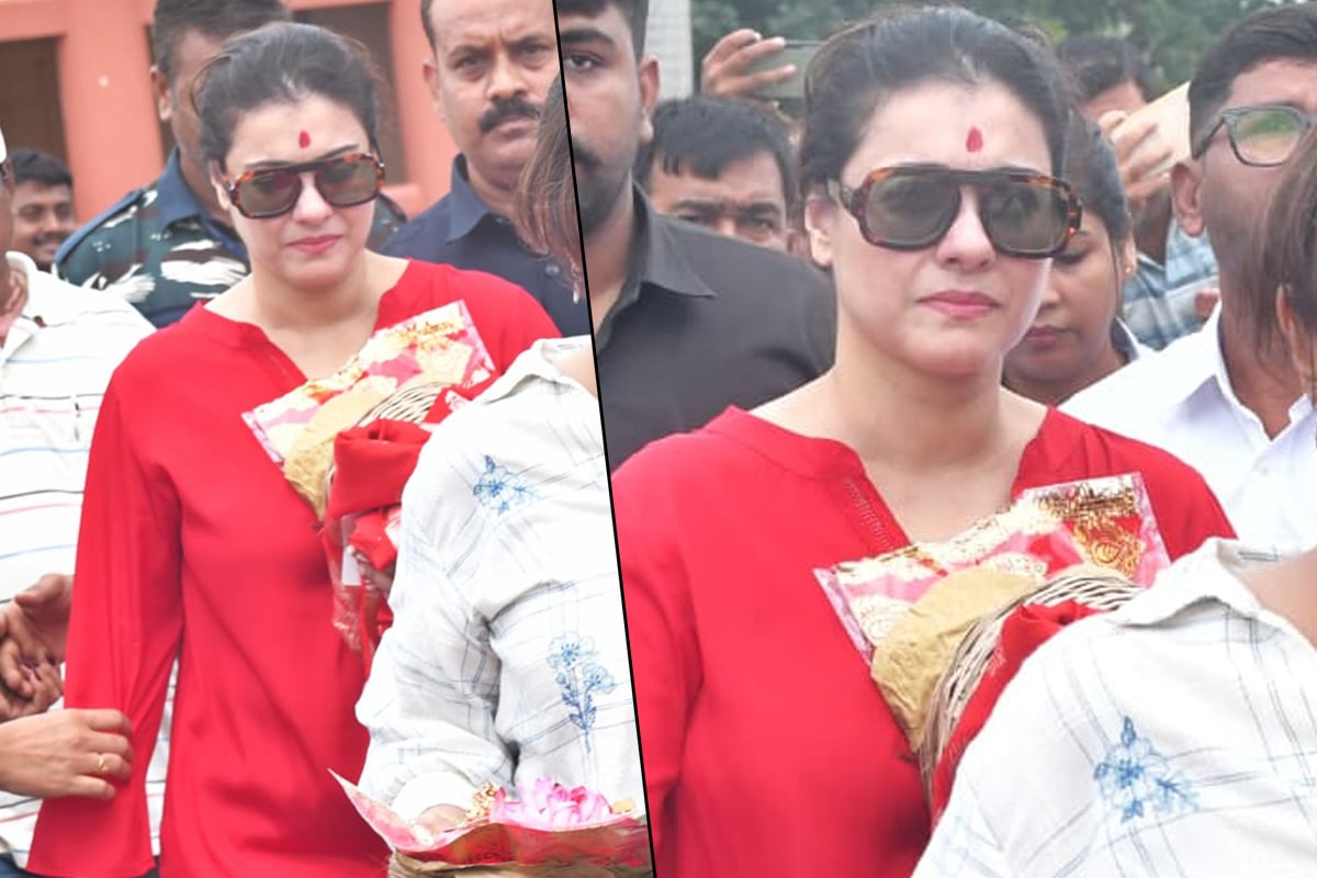 লাল পোশাক, চোখে সানগ্লাস, পুজোর ডালা হাতে দক্ষিণেশ্বরে কাজল