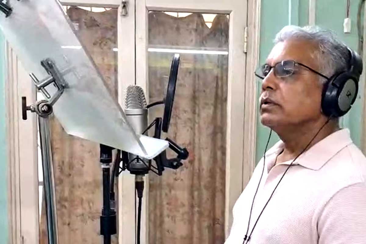 Dilip Ghosh record a song over Jhal muri