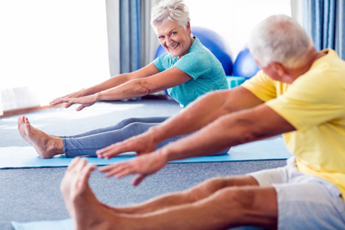 Person with arthritis following expert advice to relieve joint pain in the rainy season