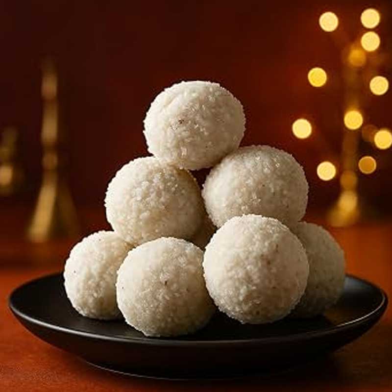 Wheat-flour laddus are offered as naivedya during the Durga Puja celebrations at Bonedi Bari
