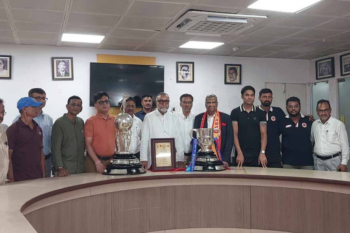 Minister Tapas Roy, along with East Bengal officials with the Durand Trophy