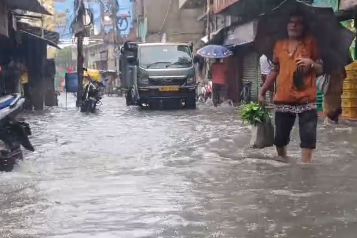 Engineers and sanitation workers deployed to tackle the waterlogging problem in Howrah