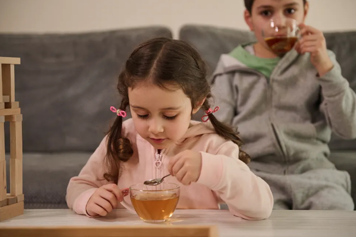 child tea drinking caffeine iron sleep health milk alternative